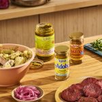 photo featuring 3 bottles of Spanish seasoning